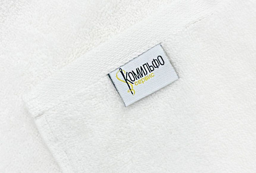 Махровое полотенце с жаккардовой этикеткой